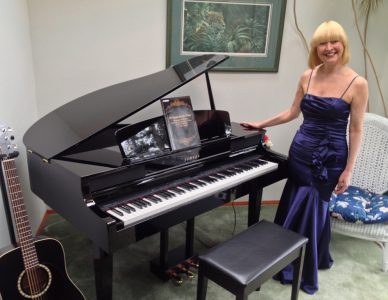 Kathy Jenkins with the piano she learned to play as she recovered from brain surgery at VGH.