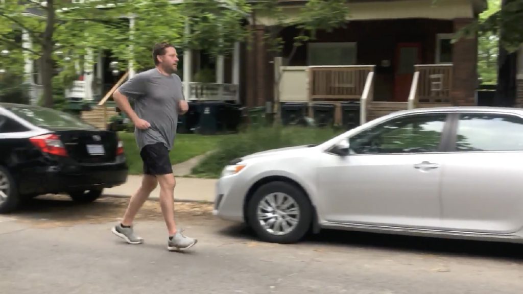 Philippe jogging outside.